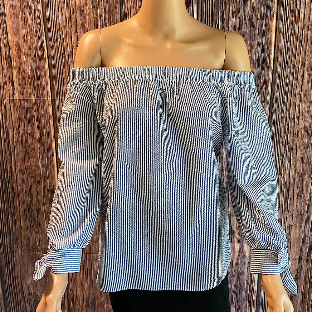 Charming Charlie’s small light blue & white vertical stripped strapless